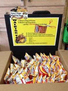 a box full of chips sitting on top of a counter