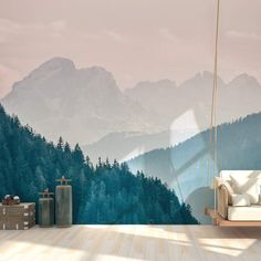 a living room with mountains painted on the wall and furniture in the foreground,