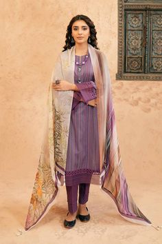 Brand: NishatProduct Code: 42401426Collection: Nishat Unstitched Spring Summer Eid EditionFabric: Lawn DESCRIPTION: Look mesmerizing with this printed three-piece from the latest unstitched summer collection. SHIRT Digital Printed Super Fine Lawn Shirt: 3 Meter Fabric: Lawn Color: Purple DUPATTA Digital Printed Silk Dupatta: 2.5 Meter Fabric: Silk Color: Ivory TROUSERS Dyed Cambric Trousers: 2.5 Meter Fabric: Cambric Color: Purple DISCLAIMER:* Lining, Laces, and Tassels are not included in unstitched variants.* Embellishment items in stitched outfits are subject to market availability.* The actual colors of the outfit may vary from the colors being displayed on your device. CARE INSTRUCTIONS: Extra Fabric Has Been Used For Shoot Original Color May Vary Slightly From The Picture Dry Clean R Ivory Trousers, Purple Dupatta, Alkaram Studio, Pakistani Dress, Lawn Fabric, Lawn Shirts, Pakistani Dress Design, Silk Dupatta, Extra Fabric