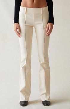 PacSun brings a touch of retro charm to your next look with the Stretch Cream Low Rise Flare Pants. These figure-flattering pants seamlessly blend a trendy low-rise design with center seam details down the legs and flattering flared leg openings, adding a vintage-inspired twist to your wardrobe in a versatile cream colorway. PacSun Womens Stretch Cream Low Rise Flare Pants - Ivory size 25 Low Rise Flare Pants, Flattering Pants, Cream Pants, Low Rise Pants, Off Black, Stretch Pants, Flare Pants, Pacsun, Work Outfit