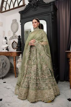 Mint Green Heavily Embellished Pakistani Wedding Dress in Pishwas Style is an ideal blend of elegance and style. This classy Pishwas is beautifully adorned with zardozi, pearls, beads, Naqshi, and motifs work creating a perfect Designer Wear for any traditional event. Embroidered Pishwas: The elegant Pishwas comes in alluring Mint Green color and it has a beautiful huge flare outfit. The Pishwas Dress is emblazoned with ravishing goldwork, embroidery, and dabka, making it a stunning choice for t Flare Outfit, Net Sleeves, Indian Wedding Makeup, Best Bridal Makeup, Pakistani Wedding Dress, Embroidered Organza, Bridal Makeup Artist, Organza Dupatta, Pakistani Dress Design