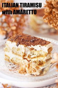 a piece of cake sitting on top of a glass plate with a fork in it