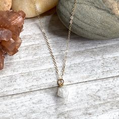 Beautiful and all-natural moonstone gemstones electoplated in 14k gold and hung from a dainty an light-catching gold fill chain. ✧ Hand-picked stones electroplated in 14k gold. ✧All natural stones ✧ High quality gold fill chain and clasp ✧ Lightweight and easy for everyday ✧ Ready for gifting in a hand-stamped boho gift box. ✧Super fast shipping. Usually same day or next day. About our gems* Each of the stones we use to create pieces were formed by nature over millions of years. Each one is uniq Gold Spiritual Crystal Necklace For Everyday, Everyday Gold Spiritual Crystal Necklace, Everyday Spiritual Gold Crystal Necklace, Dainty White Crystal Necklace With Delicate Chain, Dainty 14k Gold Necklaces With Natural Stones, White Moonstone Necklace With Delicate Chain, Delicate Moonstone Necklace With Delicate Chain, Gold Moonstone Jewelry With Delicate Chain, Dainty Gold Moonstone Jewelry