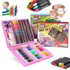 an assortment of art supplies including crayons, markers and pencils