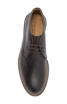 Clean lines and simple detailing streamline a chukka boot styled with traditional three-hole lacing and a cushioned, supportive footbed set on a rubber sole. Lace-up style Leather upper and lining/rubber sole Made in Italy Fall Derby Chukka Boots With Plain Toe, Business Chukka Boots With Stitched Sole, Brogue Detailed Lace-up Chukka Boots For Work, Business Lace-up Chukka Boots With Stitched Sole, Derby Lace-up Chukka Boots With Leather Sole, Casual Round Toe Chukka Boots For Derby, Lace-up Chukka Boots With Leather Sole For Derby, Lace-up Boots With Stitched Sole For Derby, Ankle-high Chukka Boots With Stitched Sole For Business