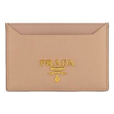 This Prada card holder wallet is crafted from luxurious Vitello Move leather in elegant Cipria beige. The compact design effortlessly slides in your pocket or a slim clutch, with 2 card slots and a center bill slot. Finished with the iconic Prada logo plaque in gold, this wallet is a fusion of luxury and functionality.    Model: 1MC208  Beige Vitello Move leather  Gold-tone hardware  Gold Prada logo plaque  Being fabric interior lining    Two credit card slots    One middle compartment    Measur Luxury Compact Card Holder For Daily Use, Luxury Card Holder With Coin Pocket For Daily Use, Luxury Compact Card Holder For Everyday Use, Classic Beige Leather Wallet, Modern Beige Wallet With Interior Card Slots, Luxury Brown Wallet With Logo Plaque, Elegant Leather Card Holder, Designer Beige Leather Wallets, Elegant Wallets With Gold-tone Logo Plaque