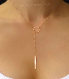 "Dainty and Beautiful Clasp-less Lariat Necklace - Perfect alone or for layering with other necklaces! * Important: See measuring instructions below. - Vertical bar is either 14K gold fill, rose gold fill or 100% sterling silver - Bar measures approx 26mm long - Small circle link is gold vermeil or sterling silver and measures 11mm - Shimmery 14k gold fill, rose gold fill or sterling silver chain - Total necklace length in picture is 20\" - Please see measuring instructions to get the right leng Rose Gold Lariat Necklace, Silver Lariat Necklace, Lariat Necklaces, Bridesmaid Jewelry Gift, Lariat Necklace Silver, Gold Lariat Necklace, Vertical Bar Necklace, Pearl Necklace Designs, Vertical Bar