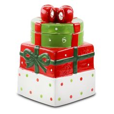 a stack of christmas presents sitting on top of each other