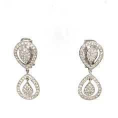 Beautiful 1950s diamond set earrings, set with Swiss cut diamonds (an earlier brilliant cut) pave set in white gold with pierced fittings, 1.5ct approximately,These are safe and secure to wear and are a great to wear with many outfits being simply set with diamonds.  A great addition to a collection. VS2-SI1, J-K Colour. 3.5cms and 8.4g. Antique Diamond Rings, Set Earrings, Diamond Drop Earrings, Diamond Drops, Antique Diamond, Platinum Ring, Diamond Set, Brilliant Cut Diamond, Diamond Solitaire