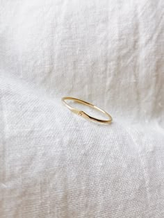 MICRO SIGNET RING A solid 14k gold ring that has a dimple on a ring with a tiny initial/letter of choice. Each ring is madd-to-order with love and is carefully handcrafted (may be slightly different than picture). This is a perfect everyday ring that is great for gifting. + 1mm band solid 14k Yellow Gold ring + Micro initial + Comes in a box + Available characters in Capital letters from dropdown bar: A B C D E F G H I J K L M N O P Q R S T U V W X Y Z + Please note all Mantle 14k gold pieces ar M And P Letter Love, M Jewelry Letter, M Ring Letter, Everyday Stackable Yellow Gold Rings With Initials, Minimalist Stackable Initial Ring In 14k Gold, Everyday Yellow Gold Initial Ring With Round Band, Simple Gold Stackable Initial Ring, Dainty 14k Gold Initial Ring Tarnish Resistant, Dainty Gold Stackable Rings With Initials