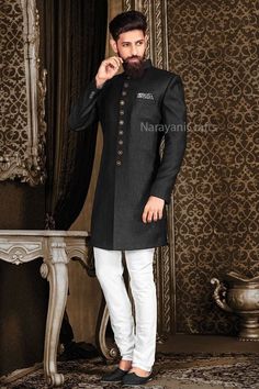 Product Description - The first and most important rule of men's style is you should feel comfortable and confident in your clothes. You will need both these attributes to pull off just about any outfit successfully. A suit that fits increases your confidence and makes you look good. Regardless of how 'classy' or expensive they might be. New Stylish handmade Decent Sherwani for men for wedding and festive occasions.  Stylish New Ethnic Sherwani for men Top Details  -  Color  -  Black Fabric  - P Black Sherwani For Groom On Eid, Black Traditional Wear For Festive Semi-formal Occasions, Black Semi-formal Traditional Wear For Festive Occasions, Black Long Sleeve Traditional Wear For Groom, Black Long Sleeve Sherwani For Groom, Black Kurta For Groom Eid Occasion, Black Traditional Wear For Groom On Eid, Black Traditional Wear For Groom, Black Sherwani For Groom For Festivals