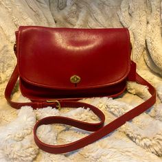 Vintage Coach City Shoulder/Crossbody Bag In Red Leather Style Number 9790. Adjustable Shoulder Strap, Brass Hardware, Zip Interior Pocket, Outside Pocket In Back And Pocket Under Flap. There Is Some Wear On The Corners (See Photos) But Overall This Bag Is In Very Good Vintage Condition. It’s A Classic Coach That You’ll Own Forever. Approximate Measurements: Length 10.5” Height 8.5” Width 3.25” Crossbody Strap Up To 20” Red Saddle Bag With Gold-tone Hardware, Elegant Red Saddle Bag With Gold-tone Hardware, Elegant Red Leather Saddle Bag, Classic Red Flap Bag For Shopping, Classic Red Shoulder Bag For Travel, Red Leather Saddle Bag With Gold-tone Hardware, Red Crossbody Flap Bag For Formal Occasions, Chic Red Saddle Bag With Detachable Strap, Red Saddle Bag For Formal Occasions