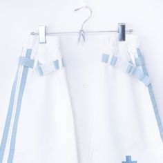 [The ultimate combination of angels and games!]
 A light blue collection inspired by the angel area has been born!
 The game-like logo and pockets are very cute.
 These leg warmers are made from jersey fabric!
 We recommend pairing it with shorts.

 size
 [Knee circumference (elastic): approx. 26-40cm] [Total length: approx. 45cm]

 ■ Country of Origin: China
 ■Material: [Polyester]
 ■ Lining: [None]
 Fabric stretch: [slightly stretchy]
 Fabric transparency: [None] White Harajuku Bottoms For Spring, White Harajuku Style Bottoms For Spring, White Harajuku Streetwear Bottoms, Harajuku Style White Streetwear Bottoms, White Harajuku Style Bottoms For Streetwear, White Harajuku Style Cotton Bottoms, White Cotton Harajuku Style Bottoms, White Harajuku Bottoms With Pockets, Blue Harajuku Style Bottoms For Summer