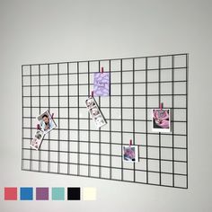 a metal grid wall with several pictures and notes pinned to the side, along with color swatches