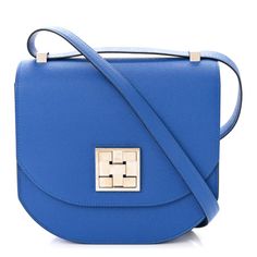 This is an authentic HERMES Epsom Mosaique Au 24-21 in Bleu Zellige. This stunning shoulder bag is beautifully crafted of Epsom calfskin leather in blue. The bag features a long leather shoulder strap with palladium links with a facing full flap that seals with a palladium stylized push closure. Blue Calf Leather Bag With Gold-tone Hardware, Timeless Blue Shoulder Bag For Evening, Luxury Blue Flap Bag With Detachable Handle, Blue Calf Leather Bag With Detachable Strap, Formal Blue Flap Bag With Detachable Strap, Blue Flap Bag With Adjustable Strap For Formal Occasions, Blue Calf Leather Shoulder Bag For Evening, Blue Luxury Flap Bag For Formal Occasions, Blue Leather Flap Bag With Gold-tone Hardware