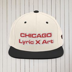 This Chi "Chicago" Lyric X Art hat is structured with a classic fit, flat brim, and full buckram. The adjustable snap closure makes it a comfortable, one-size-fits-most hat. Embroidered Design - Red, White, & Black colors in the design - Left side - 1981 • 80% acrylic, 20% wool • Green Camo is 60% cotton, 40% polyester • Structured, 6-panel, high-profile • 6 embroidered eyelets • Plastic snap closure • Green undervisor • Head circumference: 21⅝″–23⅝″ (54.9 cm–60 cm) Size guide A (inches) B (inch Chicago Lyrics, Green Camo, Heather Black, Embroidered Design, Snapback Hats, Childrens Clothes, Camo, Chicago, Product Launch