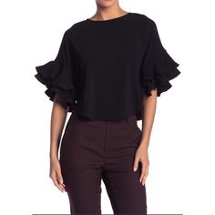 Details - Crew Neck - Short Wide Dolman Sleeves With Pleated Details - Back Zip Closure Fiber Content 100% Polyester Black Ruffle Sleeve Blouse For Fall, Black Cropped Blouse For Fall, Chic Crew Neck Office Blouse, Casual Ruffle Sleeve Tops For Office, Black Ruffle Sleeve Tops For Fall, Chic Ruffle Sleeve Tops For Work, Chic Blouse With Flutter Sleeves For Fall, Chic Fall Blouse With Flutter Sleeves, Black Ruffle Sleeve Blouse For Spring