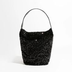 Elevate Your Style with Luxury Sparkling Sling Hobo Evening Purse Get ready to dazzle and shine with our Luxury Sparkling Sequin Ladies Sling Hobo Evening Purse! This exquisite handbag is a true fashion statement, designed to make you stand out in any crowd. With its glittering sequin exterior and big fashion bucket shopper tote design, it's the perfect accessory for trendsetters. Key Features: Versatile Occasion: This purse is perfect for a wide range of occasions, from glamorous evening parties to casual outings with friends. Interior Organization: It features a convenient cell phone pocket and interior zipper pocket to keep your essentials organized and easily accessible. Soft and Stylish: The soft construction of this hobo purse makes it comfortable to carry, while the sequined decorat Glamorous Sequined Shoulder Bag For Night Out, Black Rectangular Bucket Bag For Party, Glamorous Evening Shoulder Bag With Sequins, Chic Black Bucket Bag For Party, Glamorous Formal Bags For Summer, Glamorous Summer Event Bags, Summer Evening Sequined Shoulder Bag, Summer Evening Handheld Bag, Summer Handheld Evening Bag