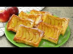 four pieces of apple pie on a green plate