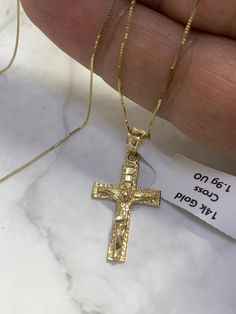 "● 14k Solid Real Gold Cross Crucifix Necklace Religious Solid Gold Charm Pendant Charm Jewelry With Box Chain Necklace 14k Real Gold Cross ●Metal Pendant : 14K Solid Yellow Gold ●Purity : 14k with authenticity stamp ●Made in : United States ●Type : Cross Crucifix   ●Chain: 14K Solid Yellow Gold Box Chain Necklace ●Length : 18\" and 20\" ●Condition : Brand New ●Complimentary Premium Jewelry box included ●Free Shipping within U.S.A Be sure to hit \"favorite\" on the right so it remains on your favorites list and/ or add to your wishlist(s). BUY GENUINE GOLD JEWELRY WITH 100% CONFIDENCE  Please visit my shop below for my other quality items: https://www.etsy.com/shop/EmpireJewelryDesign"