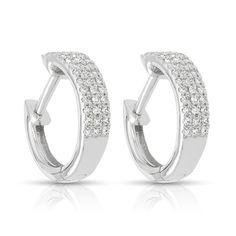 Shiny and bright, these pavé diamond earrings are perfect for daytime or formal wear. Dazzling Pave Set Diamond Earrings For Formal Occasions, Dazzling Diamond Earrings With Pave Setting For Formal Events, Formal Pave Setting Diamond Earrings, Formal Fine Jewelry Diamond Earrings With Pave Setting, Formal Diamond Earrings With Pave Setting, Dazzling Formal Diamond Earrings With Pave Setting, Diamond White Diamond Earrings With Pave Setting For Formal, Formal White Gold Diamond Earrings With Pave Setting, White Diamond Sparkling Hoop Earrings