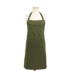 a green apron on a white mannequin