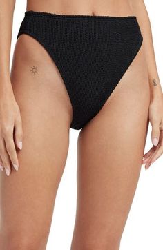 A high waist and soaring legs create an illusion of length that looks great as you lounge by the water. Cheeky back coverage Lined 95% polyester, 5% elastane Machine wash, dry flat Imported Black Owned/Founded Swimwear 2024, Swimsuit Cover Ups, Swim Bottoms, Good American, High Leg, Womens Swimwear, Looks Great, High Waist, Cover Up