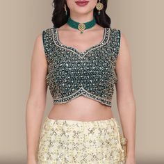 Sway into any party like a goddess in this gorgeous sequin work lehenga set! The lehenga is crafted from soft georgette fabric and is adorned with beautiful sequin work in a diamond pattern all over. The choli has matching diamond shaped sequin work embedded with diamond stone work, adding just the right amount of bling. The lehenga skirt has a contrast green border that adds a pop of color. Style this look with some statement jewelry and you're sure to make heads turn! Fabric for full length sl Work Lehenga, Green Border, Lehenga Skirt, Embroidered Lehenga, A Goddess, Georgette Fabric, Stone Work, Diamond Shaped, Color Style