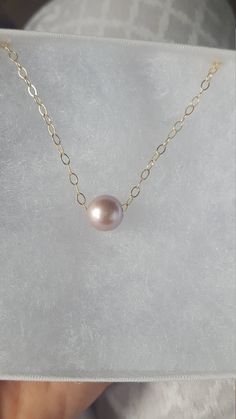 Beautiful 8-10mm Edison pearl free floating on 18 in. gold filled chain. Simple stunning ocean necklace! Edison pearls vary in color between pink and peach. Beautiful Compliments, Puka Shell Necklace, Ocean Necklace, Edison Pearls, Pearl Bangle, Puka Shell, Shell Necklaces, Gold Filled Chain, Sterling Silber