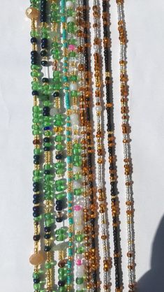 10 strands of tie on waistbeads  They are 50 inches and adjustable  Made with premium stretch cord Festival Waist Beads With Beaded Chain, Festival Waist Beads With Round Beaded Chain, Beaded Waist Chain, Belly Beads, African Waist Beads, Roanoke Va, Big Bottle, Waist Beads, Cotton String