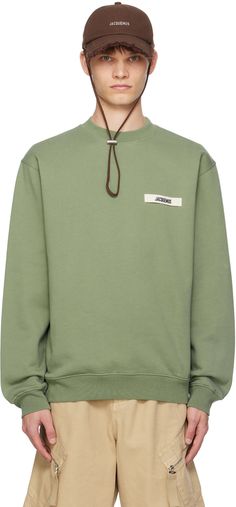 Relaxed-fit cotton fleece sweatshirt. · Rib knit crewneck, hem, and cuffs · Grosgrain logo patch at chest Part of the La Casa collection. Supplier color: Pale green Streetwear Crew Neck Sweatshirt With Logo Patch, Casual Hoodie With Double-needle Stitching For Fall, Crew Neck Cotton Fleece Hoodie With Ribbed Cuffs, Cotton Fleece Hoodie With Ribbed Cuffs And Crew Neck, Urban Sweatshirt With Logo Patch And Long Sleeves, Urban Hoodie With Logo And Crew Neck, Urban Crew Neck Hoodie With Logo Detail, Urban Sweatshirt With Logo Detail For Fall, Winter Streetwear Sweatshirt With Double-needle Stitching