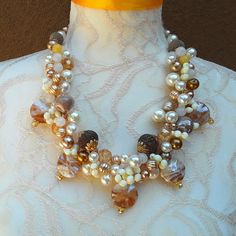 Be Dazzling in 2024!!!!!

Unique Pearl Cluster Bridal Statement Necklace - Bronze & Gold Murano Glass Pendant Collar - Twisted Wire Gift for Her


@TheFinerArtsGallery
@HiddenintheHills
https://blingbeadedbar.etsy.com Bridal Statement Necklace, Twisted Sister, Sister Necklace, Topaz Engagement Ring, Wire Necklace, Rose Quartz Beads, Pearl Cluster, Twisted Wire, Bronze Gold