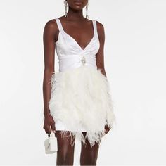 Purchased For My Wedding As Dress Change. Did End Up Getting A Different Dress. No Low Ball Offers! Price Is Final! A Vision In White, This Alessandra Rich Minidress Stands Out With A Feather Trim For Unrivaled Opulence. With A Dazzling Crystal Embellishment At Center-Front, It’s Cut From Pure Silk With A Plunging Wrap-Across Neckline. Care Instructions: Do Not Clean Closure: Zipped Back Embroidery: Glass Lining: 100% Cupro, Fully Lined Made In Italy Material: 100% Silk Material Ii: Feathers Mat Glamorous Wedding Dress With Feather Trim, Glamorous Embellished Mini Dress For Wedding, Elegant Wedding Dress With Feather Trim, White Luxury Cocktail Evening Dress, Luxury White Cocktail Evening Dress, Luxury Feather Trim Evening Dress For Wedding, Glamorous White Mini Dress For Gala, Glamorous White Evening Dress For Cocktail, Sleeveless Wedding Mini Dress With Feather Trim