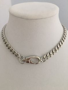 Chunky Cuban Chain Necklace-Silver Chunky Necklace-Curb Chain Necklace-Swivel Lock Clasp-Lock Necklace-Silver Spring Gate Clasp Necklace A show stopping necklace. This is a high quality chain made up of large brass silver Rhodium plated links. Lead safe and nickel free. The chain is 11mm wide and 9mm thick. Chunky and thick. Great weight and sits beautifully around the neck. This not just a regular chain. It has a fabulous heavy Rhodium plated spring lock to give a modern and edgy look. Wear the Silver Metal Necklace With Curb Chain, Silver Metal Chain Necklace With Lobster Clasp, Silver Chain Link Necklace With Lobster Clasp, Metal Cuban Link Necklace With Lobster Clasp, Everyday Silver Chain Necklace With Lobster Clasp, Silver Chunky Chain Link Necklaces, Silver Chunky Metal Chain Necklace, Silver Chunky Link Chain Necklace, Metal Cuban Link Chain Necklace With Lobster Clasp