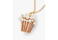 Inspired by holiday season festivities our Winter Carnival pendant showcases a faux pearl-embellished popcorn charm. | Kate Spade Winter Carnival Popcorn Pendant, Clear/Red/Gold Luxury Gold Kate Spade Necklace, Popcorn Jewelry, Carnival Popcorn, Winter Carnival, Popcorn Machine, Red Gold, Popcorn, Faux Pearl, Carnival