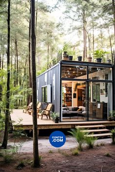 a tiny house in the woods with a deck