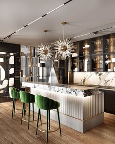 the bar is decorated in black, white and gold with green velvet chairs around it