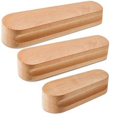 three wooden pegs sitting on top of each other