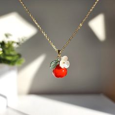 Apple necklace Trendy Red Jewelry With Fruit Design, Trendy Red Fruit Design Jewelry, Red Dangle Jewelry With Fruit Design, Cute Red Flower Jewelry, Red Fruit Design Dangle Jewelry, Red Resin Pendant Jewelry, Cute Red Resin Jewelry, Red Flower Charm Pendant Jewelry, Red Pendant Jewelry With Flower Charm