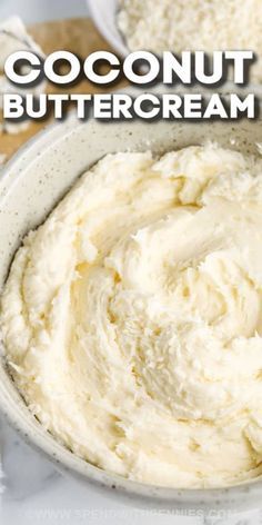 a white bowl filled with whipped cream on top of a table