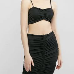 This Two-Piece Rouched Set Is Very Slinky And Sexy. The Top Is Rushed In The Front And Then That Detail Follows All The Way Down The Skirt Where You Can Adjust It With The Two Strings To Be Shorter Or Longer. The Size Says 3x But It Fits Like A 2x. Flirty Fitted Ruched Crop Top, Fitted Ruched Crop Top, Ruched Stretch Crop Top For Party, Fitted Ruched Tops For Club, Fitted Ruched Elastane Crop Top, Flirty Stretch Crop Top For Date Night, Ruched Bodycon Tops For Night Out, Bodycon Ruched Tops For Night Out, Black Ruched Crop Top For Party