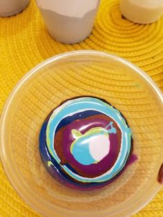 a cupcake sitting on top of a glass plate