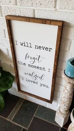 a sign that says i will never forget the moment i missed i loved you