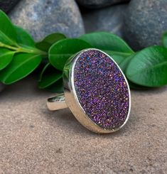 Vintage Sterling Silver Druzy Ring Size 6.25 Up for offer is a pretty vintage solid sterling silver and aura treated pyrite druzy ring.  Ring is not marked but metal has been acid tested as being solid sterling. Measurements Ring Size: 6.25 Druzy: 23mm x 16mm x 5mm Band Width: 3.5mm Weight: 7.1 g Materials -Sterling Silver -Pyrite Druzy (treated with titanium vapor to achieve the rainbow aura color) Condition: Excellent; item is pre-owned and may have some signs of light use.  Please inspect pic Rainbow Aura, Aura Colors, Rare Earth Magnets, Vintage Ring, Etsy Jewelry, Ring Vintage, Ring Ring, Druzy Ring, Sterling Ring