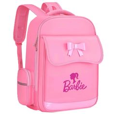 a pink backpack with a bow on the front and name barbie printed on the back