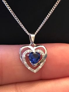 "Sterling Silver Blue Sapphire CZ Heart Necklace Blue Sapphire is the birthstone for September, this would make a great gift for those loved ones born in September. Metal: All components are made from solid .925 Sterling Silver Stone: Cubic Zirconia Measurement: pendant is 17mm (0.67\")long including bail and 12mm (0.47\") wide Choose Chain Length Please feel free to Convo me with any questions before purchasing.  Please view policy before purchasing You can find other CZ and Birthstone Jewelry Sapphire Heart Cut Birthstone Jewelry, Heart Cut Sapphire Birthstone Jewelry, Sapphire Heart Pendant Birthstone Jewelry, Sapphire Heart Pendant Jewelry As Gift, Sapphire Heart Necklace For Anniversary, Sapphire Heart Necklaces For Anniversary, Heart-shaped Sapphire Necklace For Anniversary, Sterling Silver Heart Birthstone Necklace For Birthday, Blue Pendant Birthstone Necklace For Anniversary