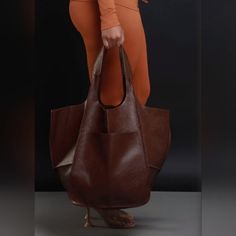 Soft Oversized Brown Leather Bag Chic Bucket Bag Tote With Pockets, Chic Bucket Tote Bag With Pockets, Chic Tote Bag With Pockets, Chic Brown Bag With Pockets, Chic Brown Bags With Pockets, Chic Brown Shoulder Bag With Pockets, Chic Shopping Bag With Pockets, Chic Satchel With Pockets In Tote Shape, Chic Large Bag For Errands