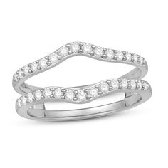 two white gold wedding bands with diamonds on each band, set in 18k white gold