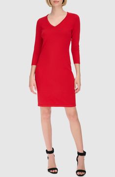 Enjoy the versatility of this V-neck sweater-dress knit from soft, lightweight yarns in a stretchy body-con silhouette. 36" length Slips on over head V-neck Three-quarter sleeves Unlined 75% rayon, 25% nylon Machine wash, line dry Imported Casual V-neck Elastane Mini Dress, Winter V-neck Stretch Bodycon Dress, Red V-neck Bodycon Dress For Winter, V-neck Bodycon Dress For Winter, Winter Bodycon Dress In Elastane, Winter Elastane Bodycon Dress, Elegant Crew Neck Mini Dress, Elegant Solid Mini Dress With Crew Neck, Elegant Solid Color Mini Dress With Crew Neck