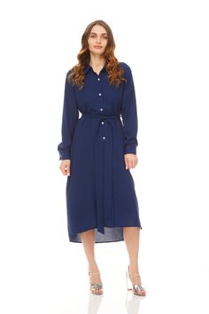 Hi Lo dress. Long sleeves that are easy to adjust. Point collar. Detachable belt. Snap in between buttons. Sizing *Model is 5"8 wearing a size small Fabric 97% Polyester, 3% Spandex Care Blue Belted Button-up Dress, Fitted Long Sleeve Belted Dress For Daywear, Blue Belted Button-up Shirt Dress, Fitted Maxi Dress With Belt For Work, Solid Color Belted Shirt Dress For Daywear, Casual Long Sleeve Belted Dress For Daywear, Long Sleeve Dresses With Belt For Daywear, Casual Office Dress With Belted Cuffs, Belted Button-up Maxi Dress For Daywear